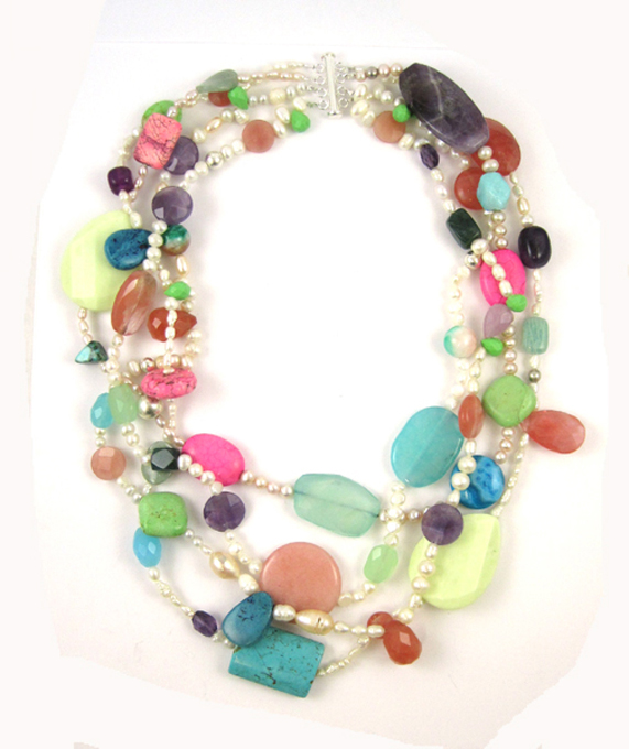 Appraisal: FOUR-STRAND PEARL AND GEMSTONE NECKLACE the multi-strand fresh water pearl