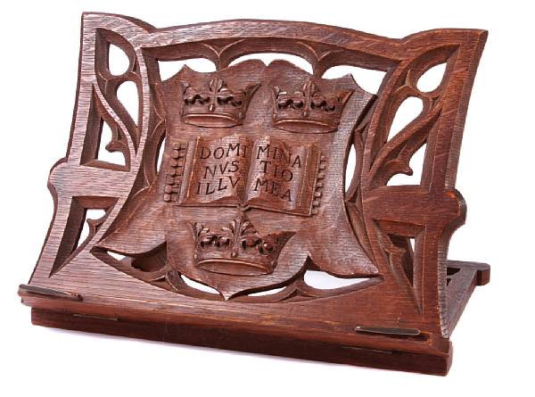 Appraisal: An English carved oak reading stand height in width in