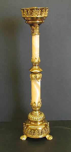 Appraisal: A Renaissance Revival onyx and gilt brass altar candlestick first