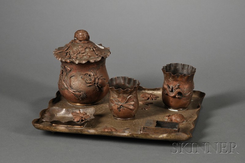 Appraisal: Aesthetic Movement Japonisme Patinated Metal Smoking Set late th century