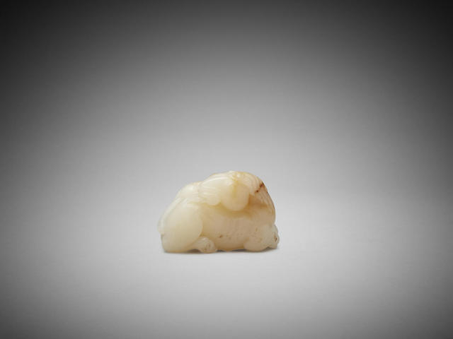 Appraisal: A Chinese white jade carving of a horse cm wide