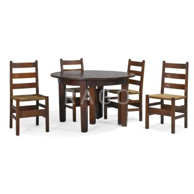 Appraisal: GUSTAV STICKLEY Dining set five-legged table and four ladderback chairs