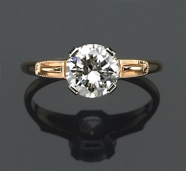 Appraisal: A diamond single-stone ring featuring a round brilliant-cut diamond diamond