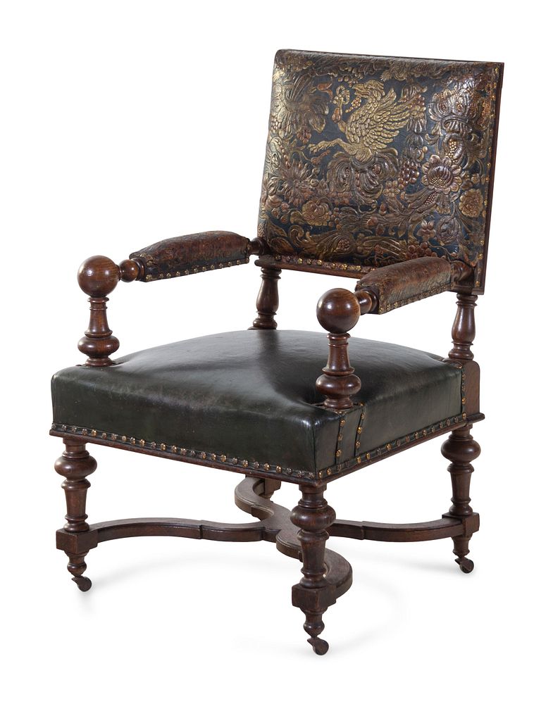 Appraisal: An English Embossed Leather Library Chair An English Embossed Leather