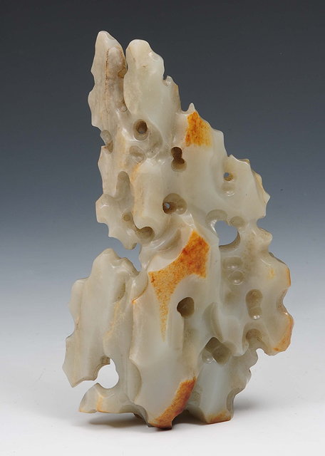 Appraisal: A Chinese white and russet jade boulder th Centuryin the