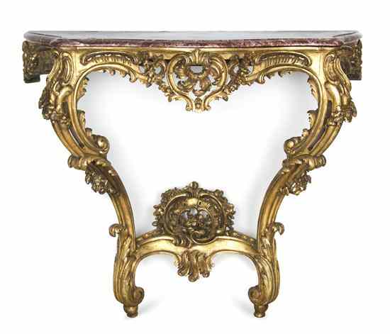 Appraisal: A Louis XV Style Giltwood Console Table having a serpentine