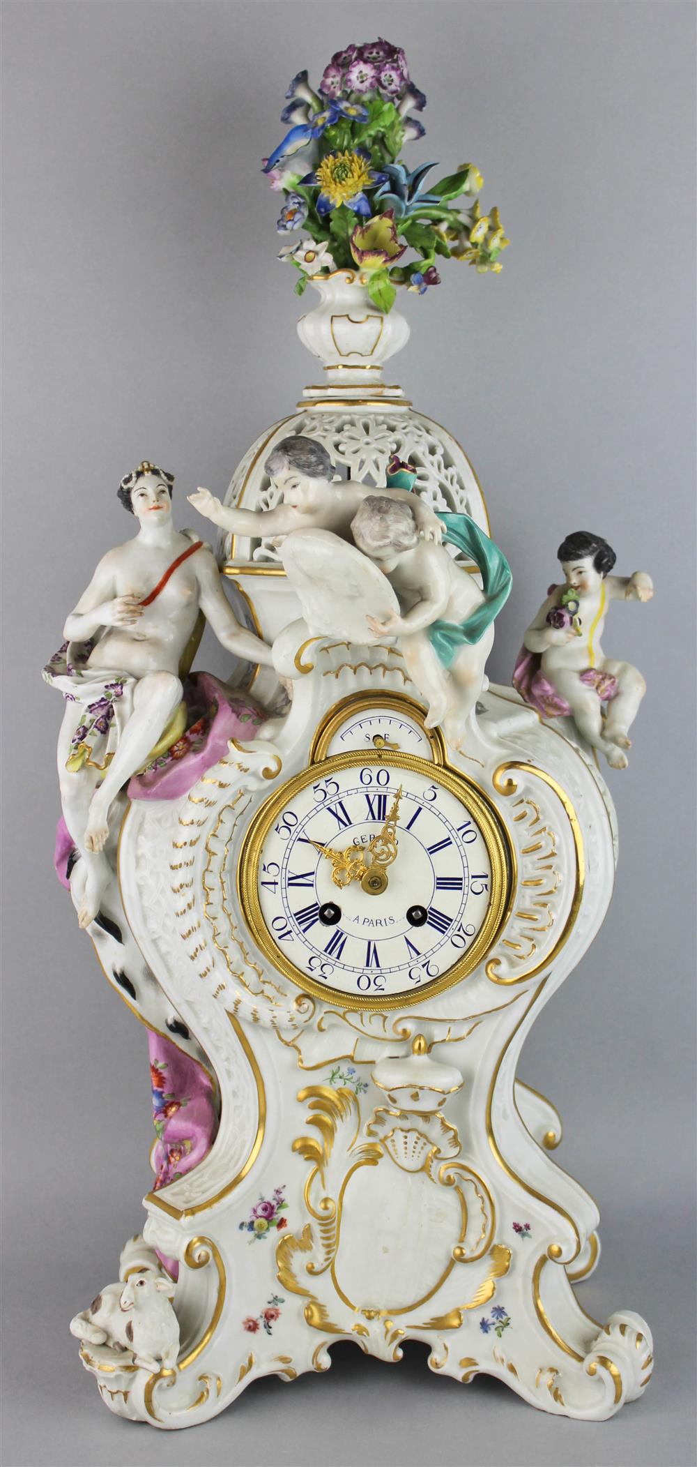 Appraisal: CONTINENTAL PORCELAIN MEISSEN STYLE MANTEL CLOCK bearing blue crossed swords