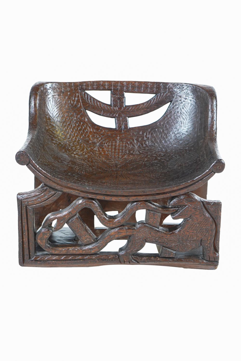 Appraisal: AFRICAN CARVED WOOD BENCHCondition with minor nicks and scrinchess commensurate