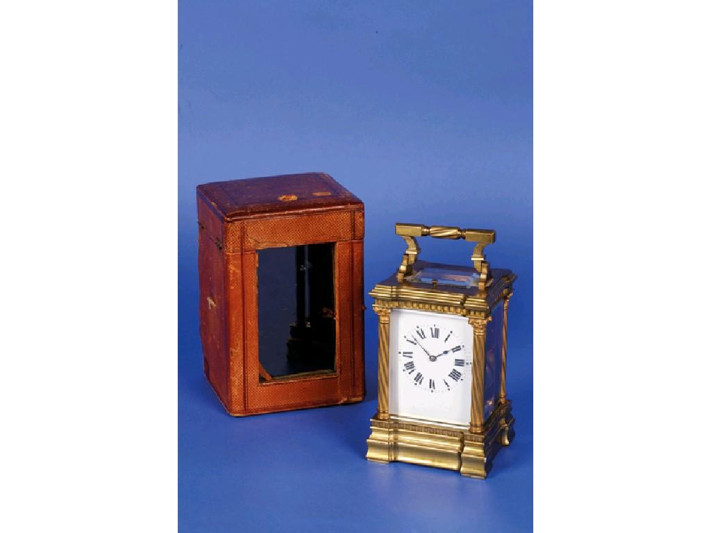 Appraisal: A FRENCH GILT-BRASS QUARTER REPEATING CARRIAGE CLOCK the white enamel