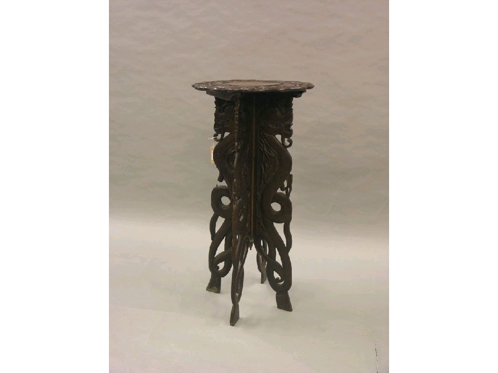 Appraisal: An Indian carved hardwood occasional table circular top carved with