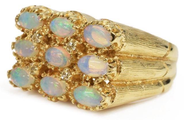 Appraisal: Estate kt yellow gold ring with nine natural black opal