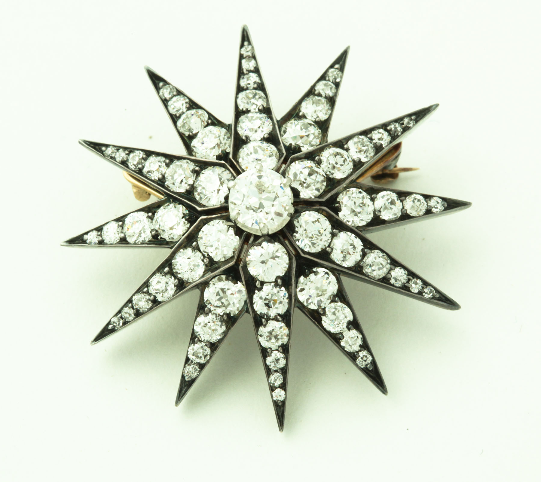 Appraisal: VINTAGE TIFFANY DIAMOND BROOCH Tiffany Company - Starburst brooch Central