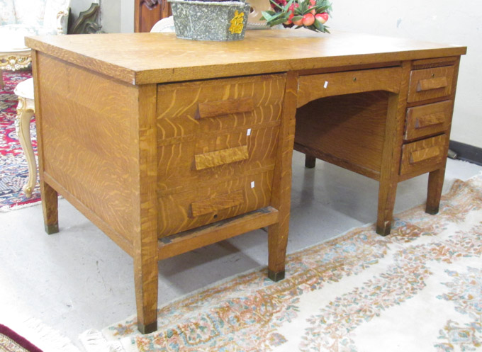 Appraisal: AN OAK FLAT-TOP DESK American early th century having a