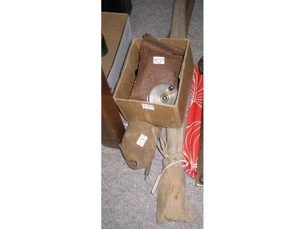 Appraisal: Lot comprising two fishing rods and a box of reels