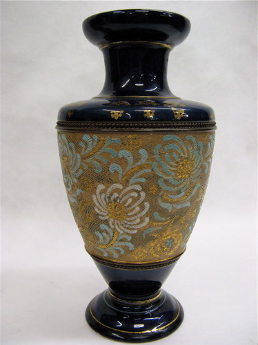 Appraisal: ENGLISH ROYAL DOULTON POTTERY VASE enameled having an embossed tapestry