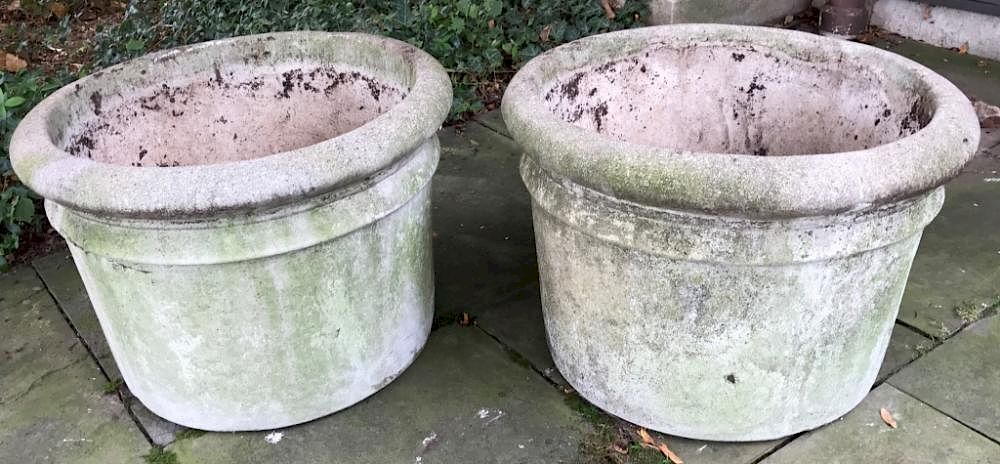 Appraisal: Large Pair of Smoothed Cast Stone Planters Large pair of