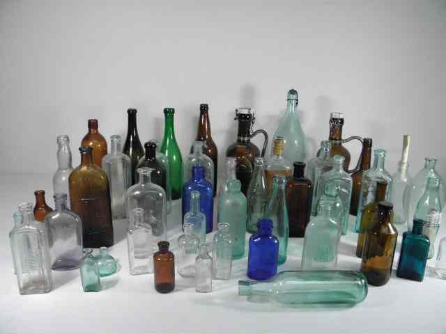 Appraisal: Large lot of various assorted antique glass bottles pieces Includes