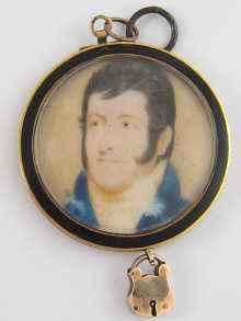 Appraisal: A miniature portrait of a gentleman in a yellow metal