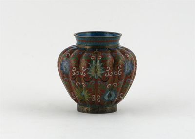 Appraisal: A small Chinese cloisonn ribbed ovoid vase decorated with lotus