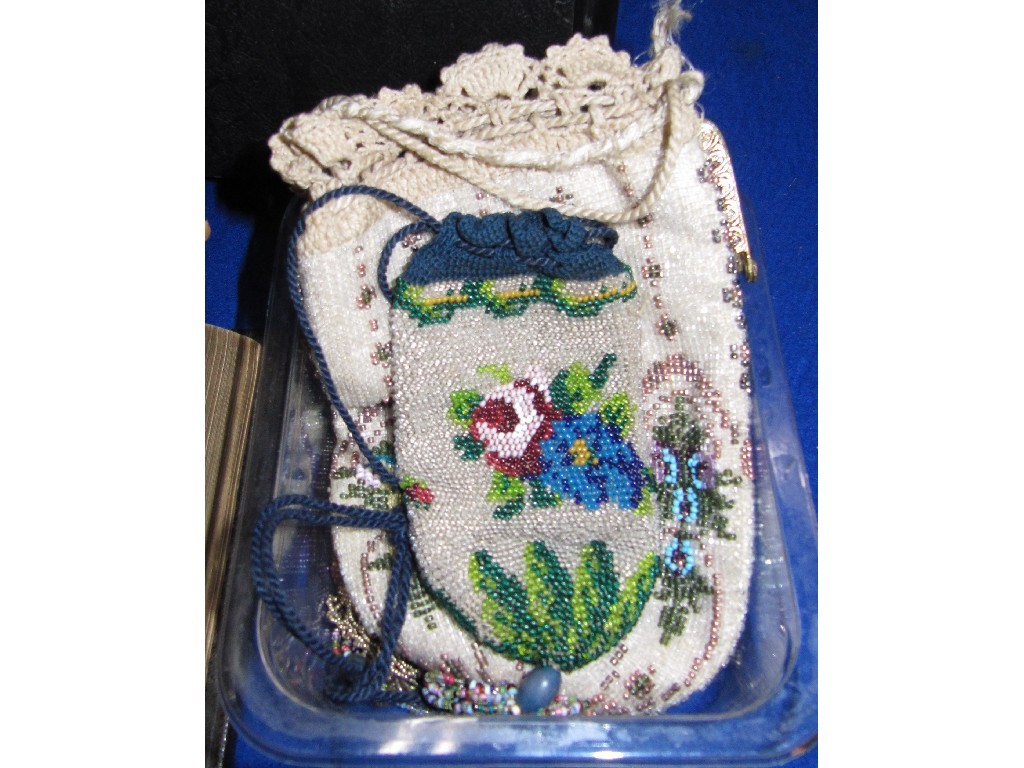 Appraisal: Lot comprising four beadwork purses