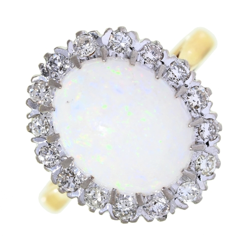 Appraisal: An opal and diamond cluster ring in gold marked ct