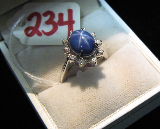 Appraisal: STAR SAPPHIRE DIAMOND AND FOURTEEN KARAT WHITE GOLD RING ten