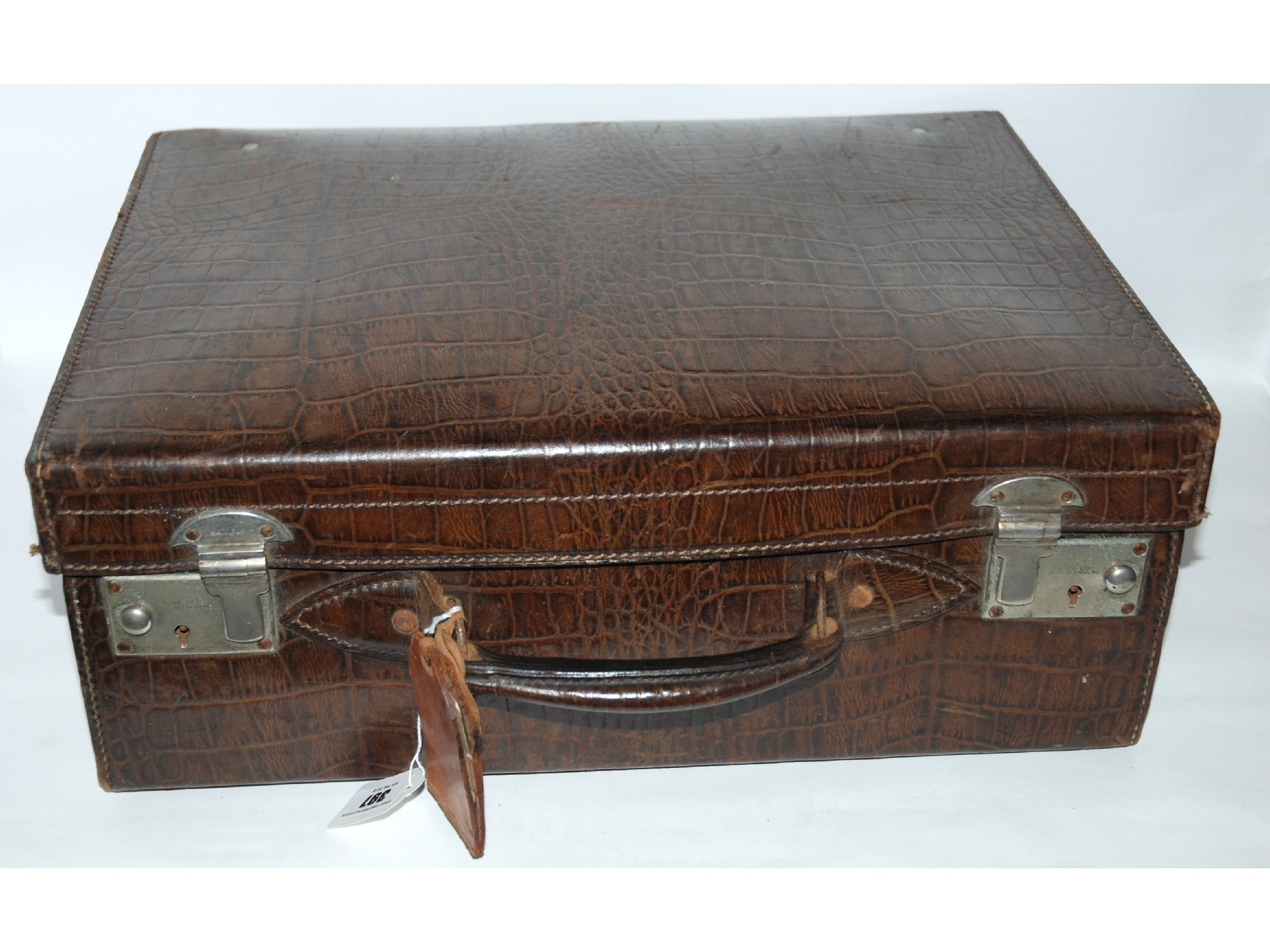 Appraisal: A fitted crocodile skin travelling case