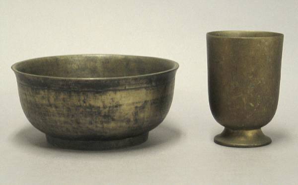 Appraisal: A Tibetan bronze ceremonial bowl With incised Tibetan character on