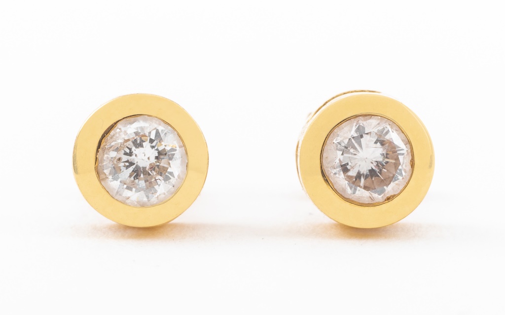 Appraisal: K YELLOW GOLD DIAMOND STUD EARRINGS K yellow gold pair