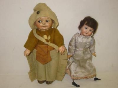 Appraisal: A German clockwork bisque head dancing doll the head with