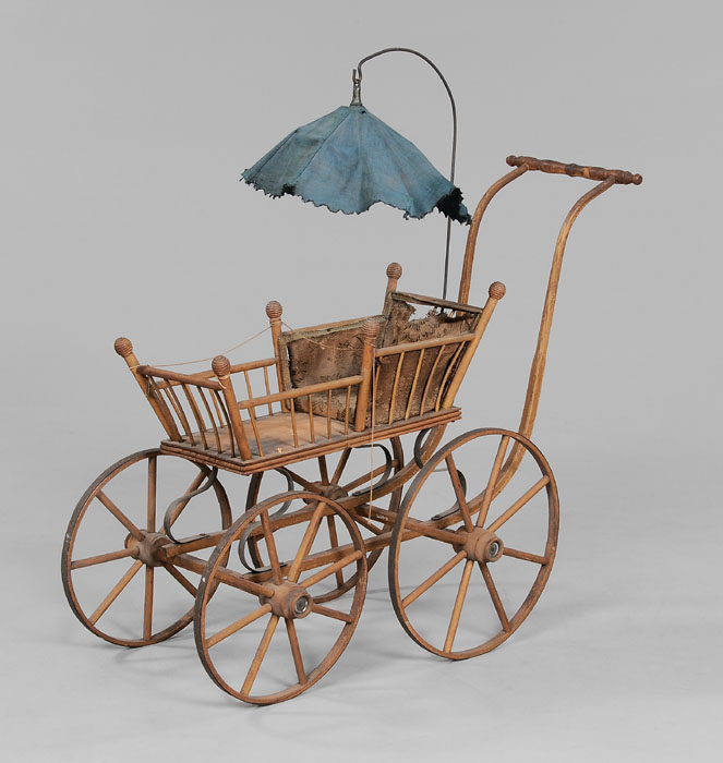 Appraisal: Victorian Doll Buggy American early th century carriage with fabric