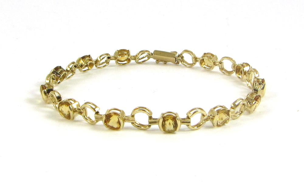 Appraisal: CITRINE AND FOURTEEN KARAT GOLD BRACELET measuring - in length