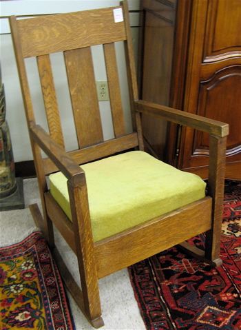 Appraisal: MISSION OAK ROCKING ARMCHAIR American Arts Crafts c the back