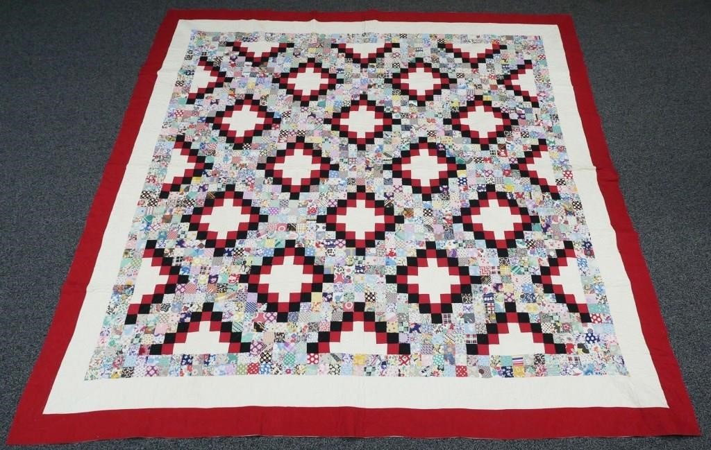 Appraisal: Antique hand made quilt in a square and diamond pattern