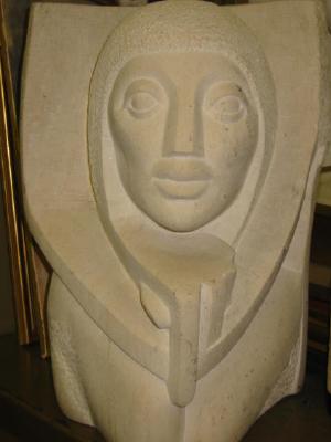 Appraisal: A CARVED LIMESTONE FEMALE HEAD by Dawn Rowland x together