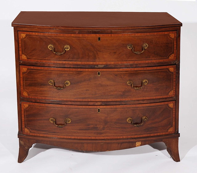 Appraisal: A TH CENTURY MAHOGANY BOW FRONT CHEST of three long