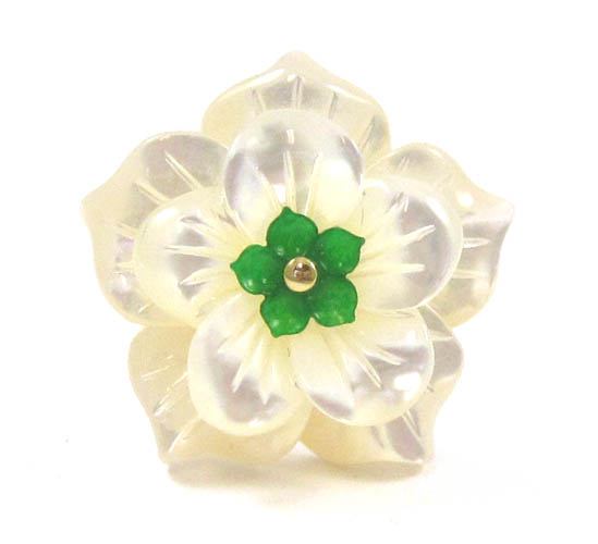 Appraisal: MOTHER-OF-PEARL AND GREEN JADE RING The k yellow gold band