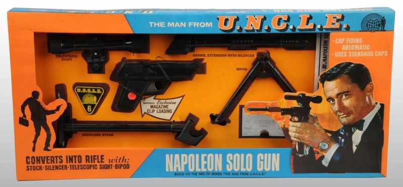 Appraisal: Napoleon Solo Gun Description Man from UNCLE beautiful display set