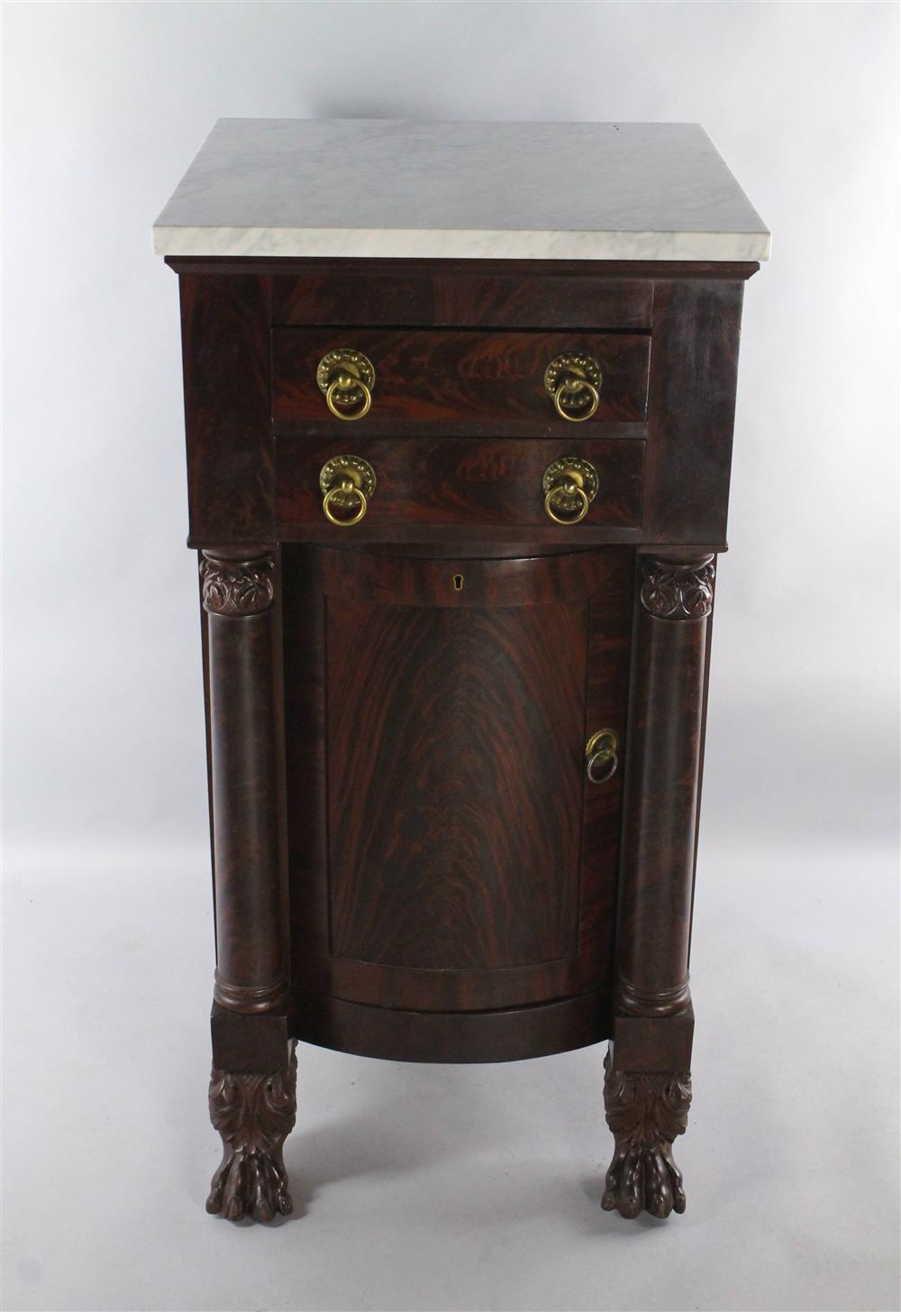 Appraisal: AMERICAN CLASSICAL CARVED MAHOGANY PEDESTAL CABINET WITH MARBLE TOP ca