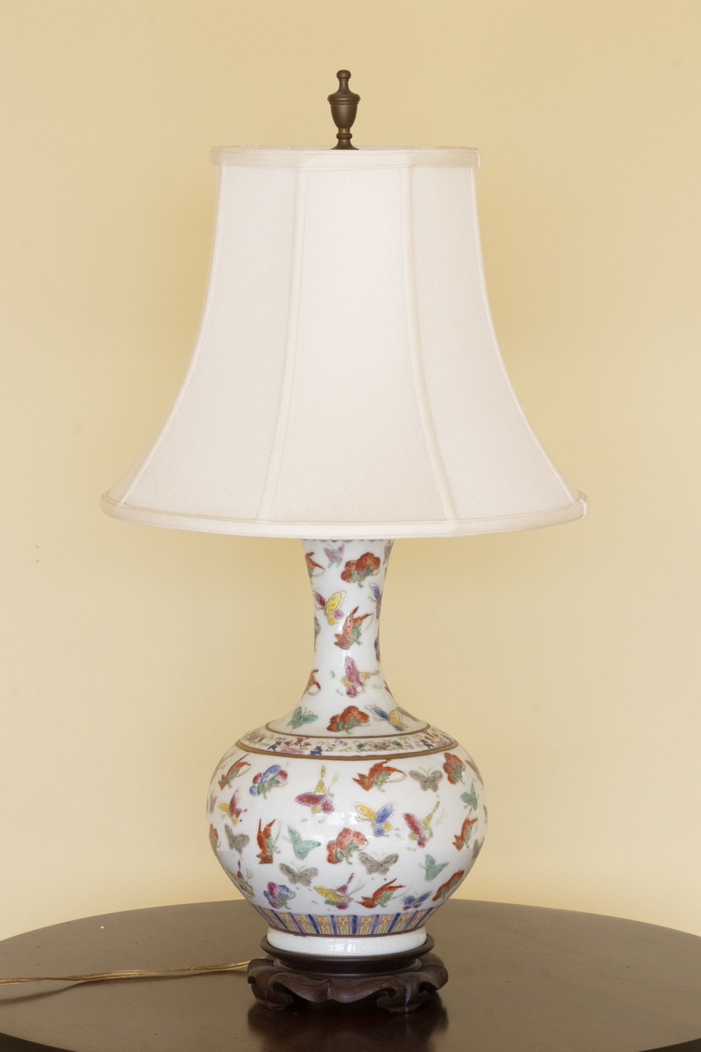 Appraisal: ASIAN VASE LAMP An Asian vase painted with assorted butterflies