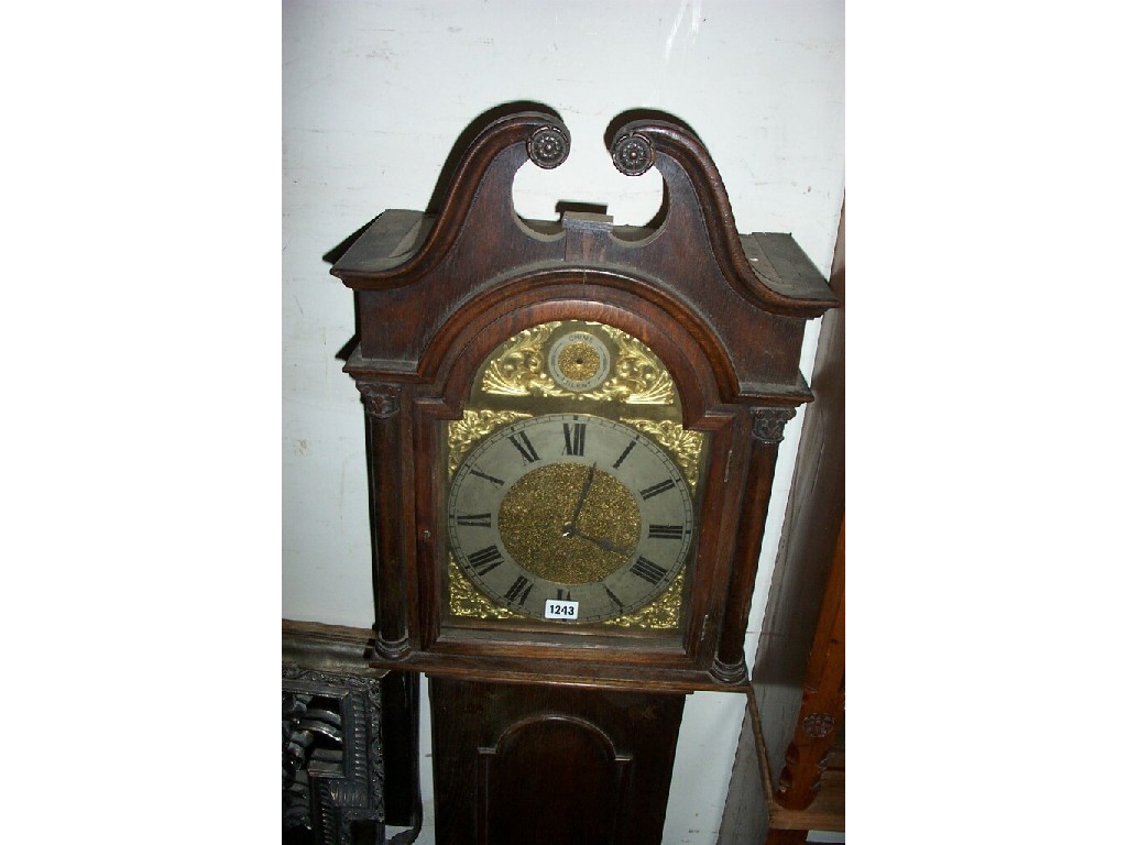 Appraisal: A small Edwardian oak longcase clock in an th century