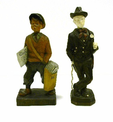 Appraisal: Automen two large whistling windups ''Newspaper boy'' brass works marked