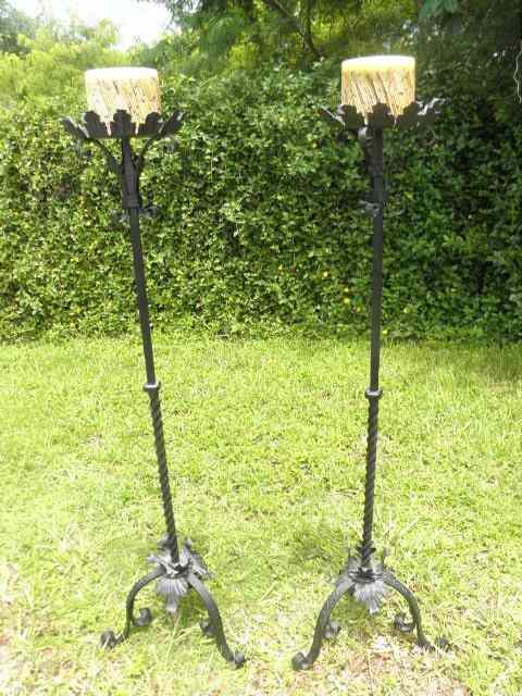 Appraisal: Pair of black scrolled wrought iron floor candle stands Both