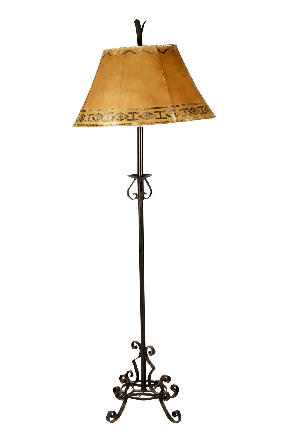 Appraisal: SPANISH REVIVAL STYLE IRON FLOOR LAMPwith a black-painted parchment shade