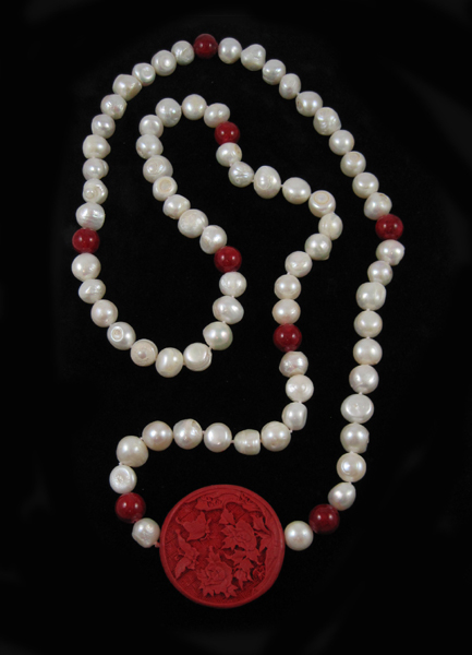 Appraisal: ROPE LENGTH CINNABAR AND PEARL NECKLACE measuring inches in length