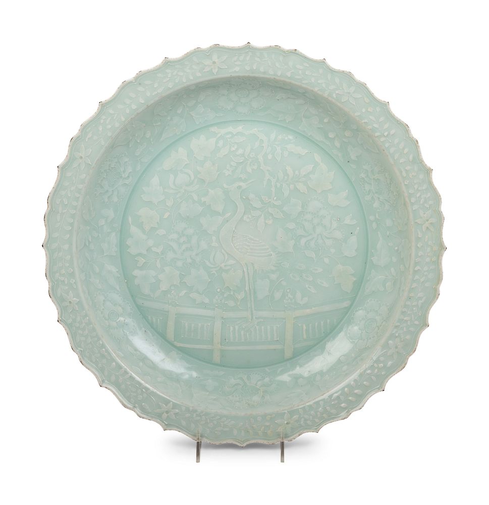 Appraisal: A Chinese Molded Celadon Glazed Porcelain Charger A Chinese Molded