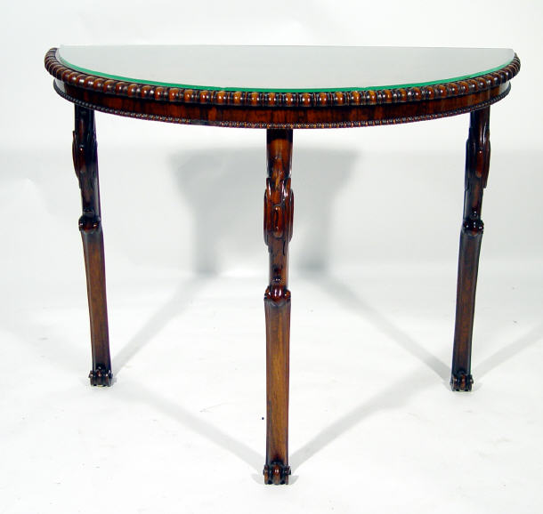 Appraisal: Victorian rosewood demi lune hall table with cockbeaded edge and