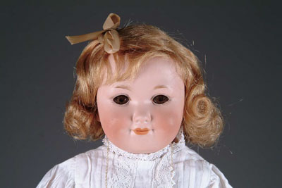 Appraisal: BABY PEGGY CHARACTER DOLL A smiling German shoulder-head character on