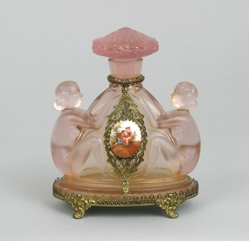 Appraisal: A Czech Figural Nude Perfume Bottle in Pink Glass A