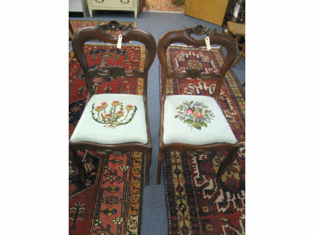 Appraisal: Pair of Victorian Carved Mahogany Side Chairs fine floral needlepoint